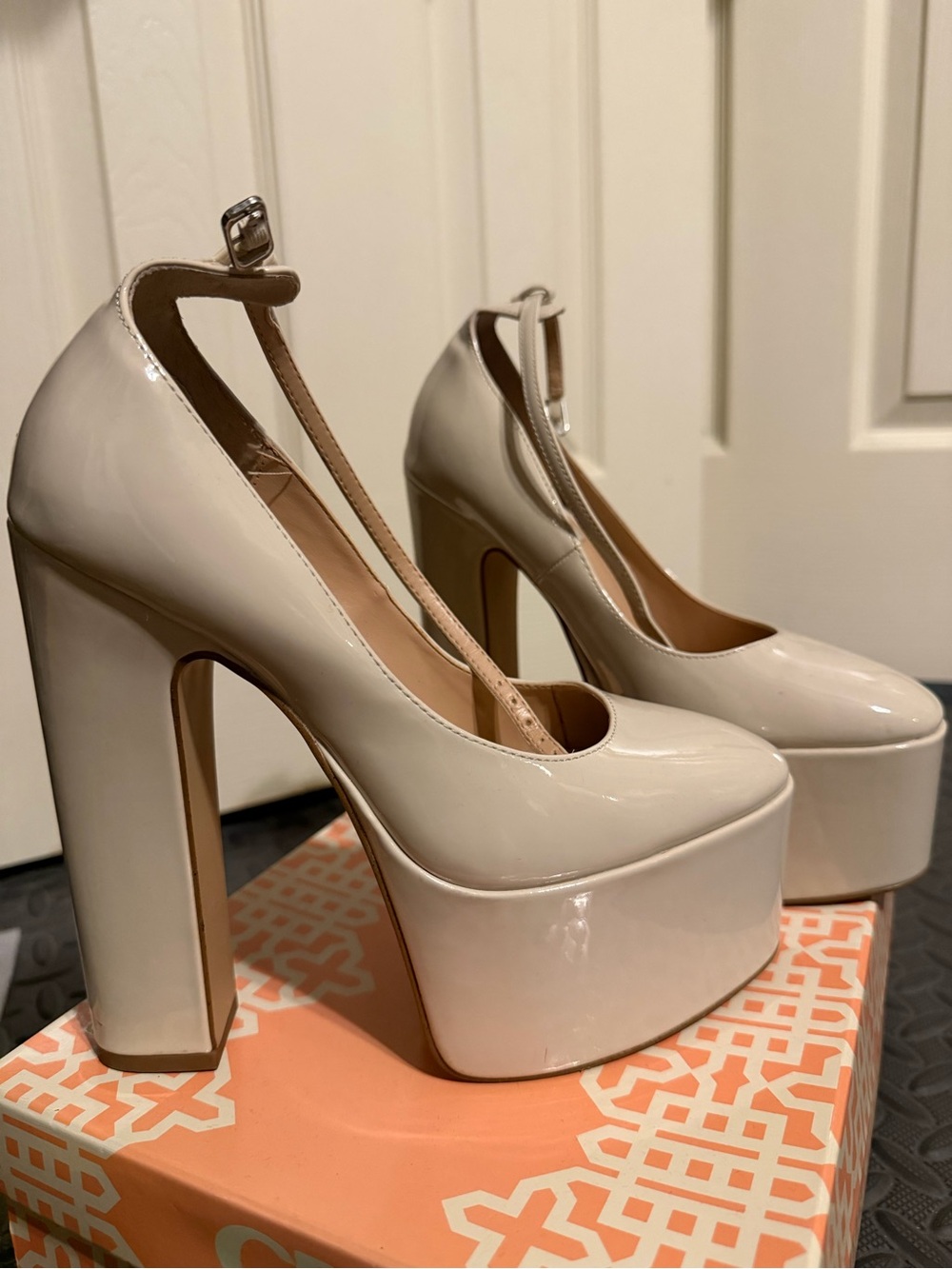 Steve Madden Patent Platform T-Strap Pumps in Cream
